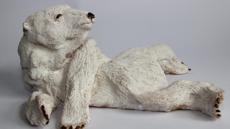 Polar bear chilling - Nick Bennett Sculptor